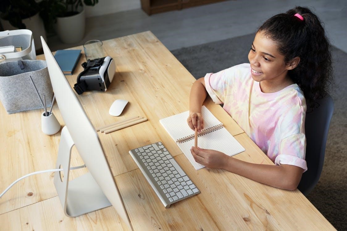 Girl learning in front of a computer