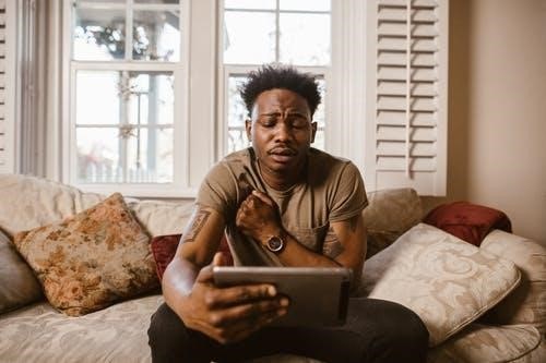 Man speaking while watching a movie