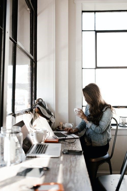 Woman learning online on laptop