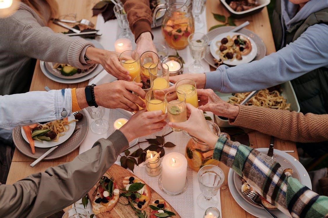 Picture showing people having food