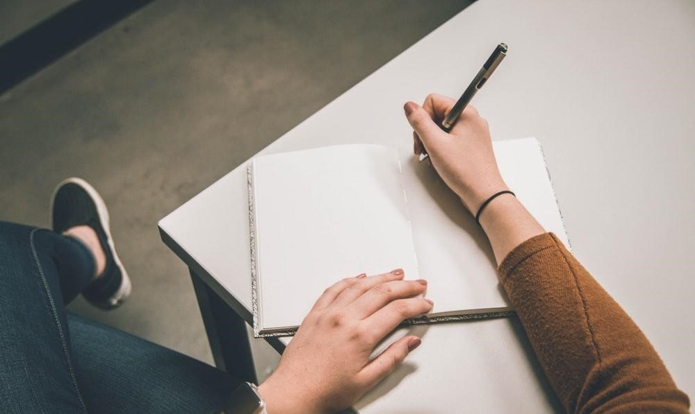 Woman taking notes