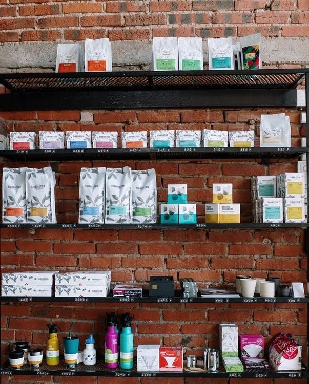 cosmetic products on a wooden shelf