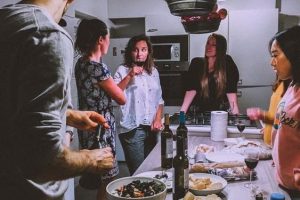 a group of friends talking over dinner