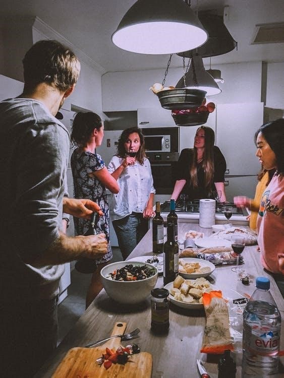 a group of friends talking over dinner